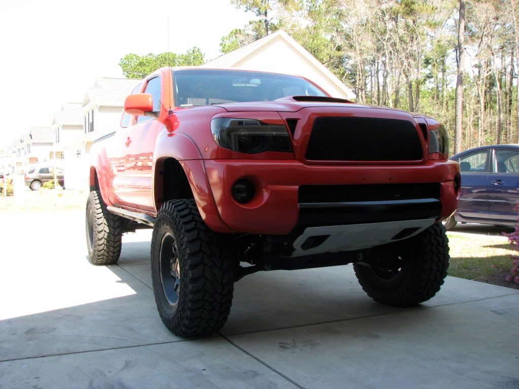 Red Tacoma Lifted