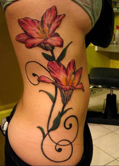 flowers tattoos on chest. flowers-chest-womens-girls-
