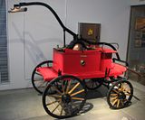 1895 Hunnia Horse Drawn Carriage with Water Pump