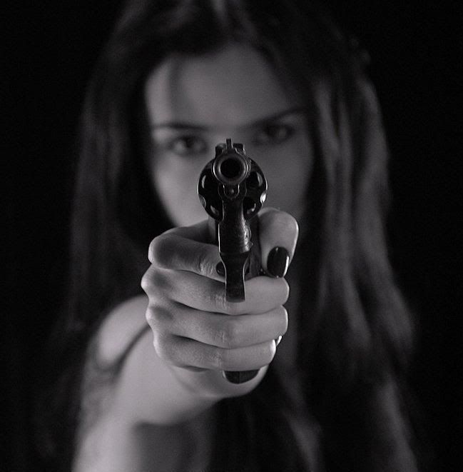 Woman With Shotgun